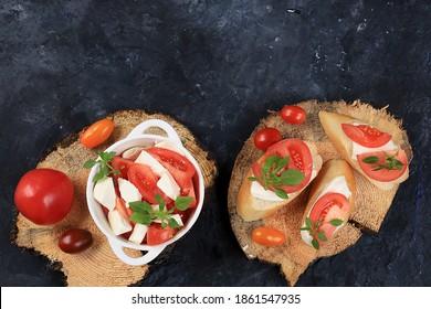 Caprese et toast bruschetta avec fromage mozzarella, tomates cerises et basilic de jardin frais. Cuisine italienne traditionnelle, petit-déjeuner naturel sain, sans cholestérol et sans OGM, espace de texte, sélection