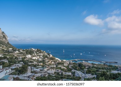 Capri City On Capri Island With Tyrrhenian Sea With Boats In Summer Time