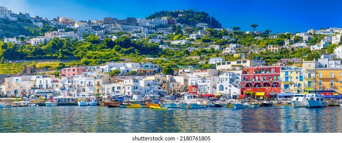 Capri, Italy - June 2021: Panoramic View Of City Port And Colorful Homes.