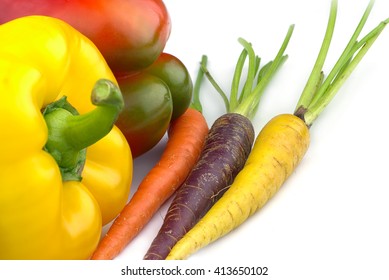 Capsicum And Dutch Carrots Isolated On White Background