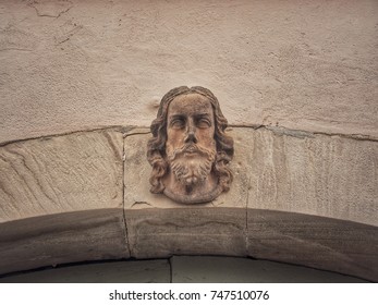 Capstone On An Archway In Form Of A Head Statue