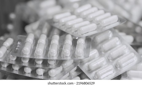 Capsule Blisters. Drug Components Medical Product Pellet Capsules. Pills With Blister Pack On White Background. Healthcare And Pharmaceutical Industry Concept. Depth Of Field