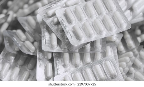 Capsule Blisters. Drug Components Medical Product Pellet Capsules. Pills With Blister Pack On White Background. Healthcare And Pharmaceutical Industry Concept. Depth Of Field