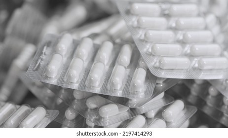 Capsule Blisters. Drug Components Medical Product Pellet Capsules. Pills With Blister Pack On White Background. Healthcare And Pharmaceutical Industry Concept. Depth Of Field