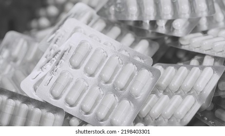 Capsule Blisters. Drug Components Medical Product Pellet Capsules. Pills With Blister Pack On White Background. Healthcare And Pharmaceutical Industry Concept. Depth Of Field