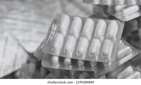 Capsule Blisters. Drug Components Medical Product Pellet Capsules. Pills With Blister Pack On White Background. Healthcare And Pharmaceutical Industry Concept. Depth Of Field