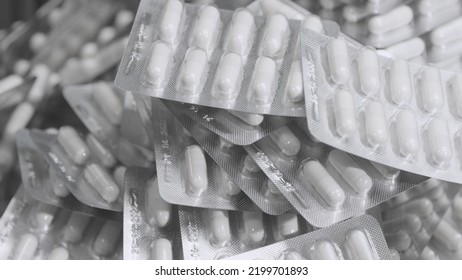 Capsule Blisters. Drug Components Medical Product Pellet Capsules. Pills With Blister Pack On White Background. Healthcare And Pharmaceutical Industry Concept. Depth Of Field