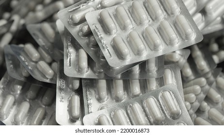 Capsule Blisters. Drug Components Medical Product Pellet Capsules. Pills With Blister Pack On White Background. Healthcare And Pharmaceutical Industry Concept. Depth Of Field