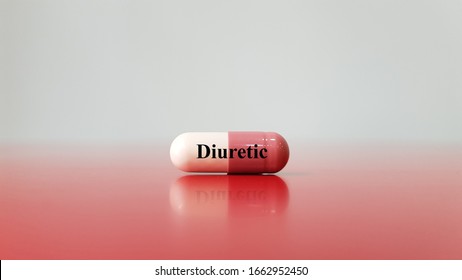 Capsule Of Diuretic Drug. This Diuresis Medicine Used For Increase Urine Excretion. It Used For Treatment Hypertension Disease, Heart Failure, Kidney Disorder. Medical Therapy Technology Concept.