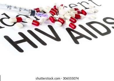 Capsule And Syringe On Paper Write AIDS And HIV, Medication Sickness