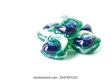 Capsules with detergent for washing machine on white background.Washing gel pods.Dishwasher capsules.Washing and clean things.Housework concept. - Powered by Shutterstock