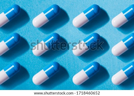 
Capsules pattern on blue background