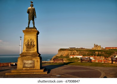 Captain Cook Statue In Whitby Harbour Bay, North Yorkshire