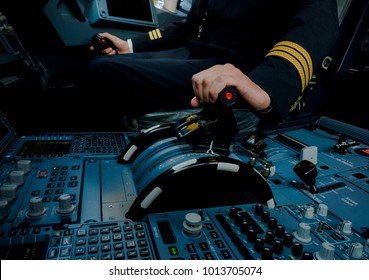 Captain Hand Accelerating On The Throttle In Commercial Airplane