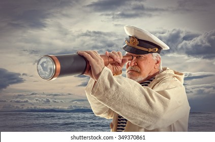 Captain looks through a telescope