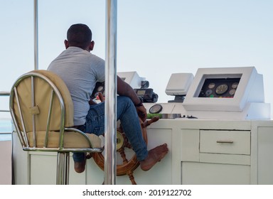 Captain Of The Ship Controls The Feet Of The Helm In Egypt