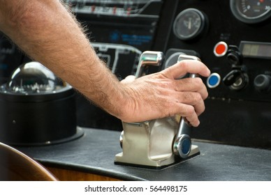 Captain's Hand On Ship Throttle.