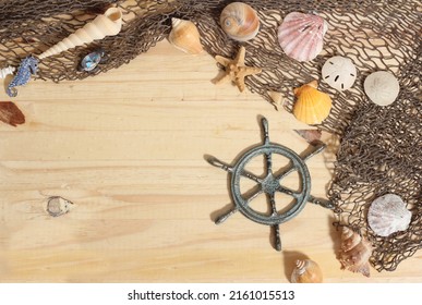 Captains Wheel With Fishing Net And Sea Shells Nautical Theme Background