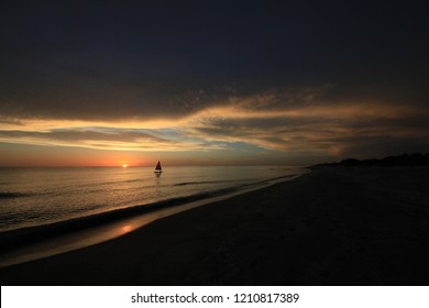 Captiva Island, Florida - 08/05/2015: Sailboat (Sunfish) At Sunset Off The Beach In Captiva Island, Florida.