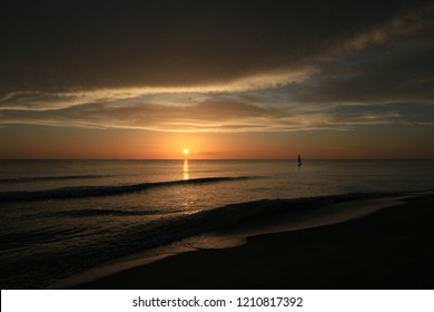 Captiva Island, Florida - 08/05/2015: Sailboat (Sunfish) At Sunset Off The Beach In Captiva Island, Florida.