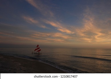 Captiva Island, Florida - 08/05/2015: Sailboat (Sunfish) At Sunset Off The Beach In Captiva Island, Florida.