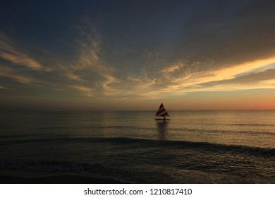 Captiva Island, Florida - 08/05/2015: Sailboat (Sunfish) At Sunset Off The Beach In Captiva Island, Florida.