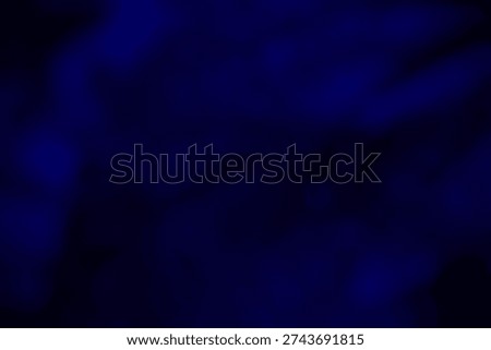 A captivating abstract background featuring deep blue tones and soft nebula effects, inspired by cosmic phenomena and night sky landscapes for creative projects and digital design.