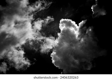 Captivating aerial view of dramatic black n white cloud formations, showcasing mesmerizing styles, shapes, and textures. Fit for visuals Storytelling.