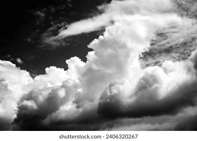 Captivating aerial view of dramatic black n white cloud formations, showcasing mesmerizing styles, shapes, and textures. Fit for visuals Storytelling. - Powered by Shutterstock