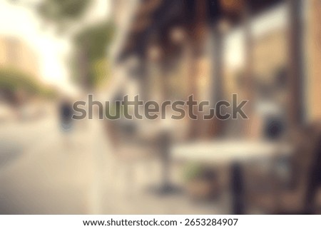 Captivating outdoor cafÃ© scene featuring empty tables and chairs, inviting a serene atmosphere for customers. Blurred street view adds depth.