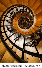 The captivating photo of the spiral staircase in St. Istvan Cathedral, Budapest, showcases the craftsmanship and architectural prowess of the time. 