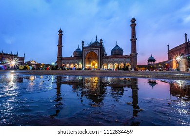 Captivating reflection of Jama Masjid during blue hour at Ramazan right after a mild rainfall