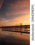 Captivating sunset scenery unfolds at The Rio Tinto Pier (Muelle de Rio Tinto) in Huelva, Andalusia, Spain,