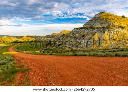 A captivating trail winds through Theodore Roosevelt National Park's majestic canyons