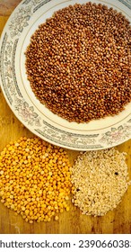 Capture split chickpeas and black lentils in one frame photograph.