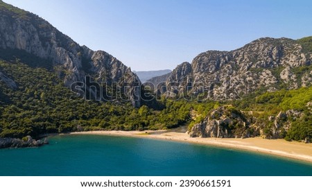 Captured the breathtaking beauty of Olimpos, Cirali Beach in Antalya, Turkey on a spectacular summer day in 2023, using a drone to explore the coastline and the majestic mountains in the background. 