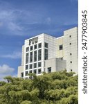 Captured image of Florida International University’s Green Library on a clear and beautiful spring day.m with bright sun