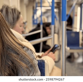 Capturing Candid Moments on Public Transport A Unique Commuters Journey Experience. A vivid snapshot of daily life on public transport, capturing connection and solitude in the citys hustle. - Powered by Shutterstock - Get 15% off with code: PIKWIZARD15