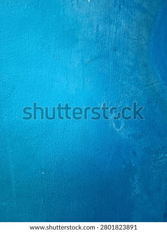 capturing the interplay of color and surface detail ,this deep blue backdrop offers a clean sophisticated texture 