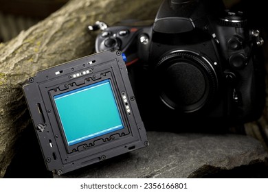 Capturing Perfection: 4K Close-Up of Digital Camera Sensor on Stone - Shutterstock ID 2356166801