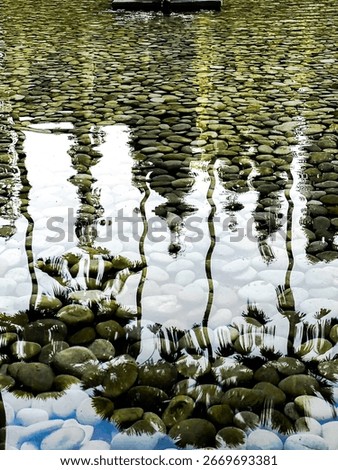 Capturing shadows on the surface of calm water