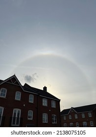 Capturing the Sky Halo effects in a village. It is an optical phenomenon produced by light interacting with ice crystals suspended in the atmosphere.