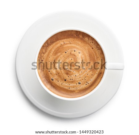 Capuccino coffee in cup isolated on white background, top view
