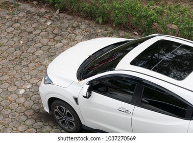 Car From Above In The Parking Area Of A Top View Of The House