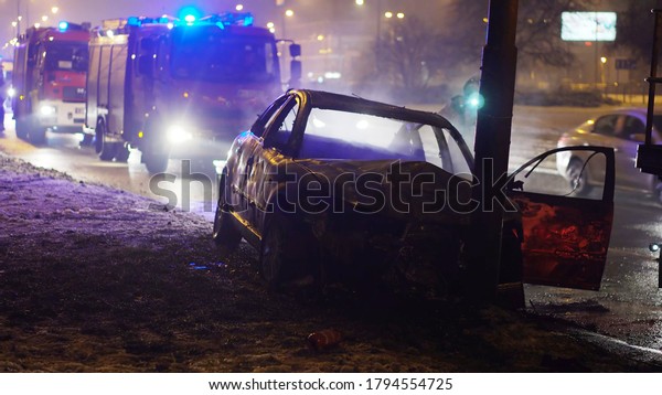 car accident. burned car after heavy\
collision. Black and white. High quality\
photo