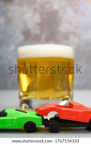 car accident with cup of beer at background concept of drunk driving no logo no trademark
