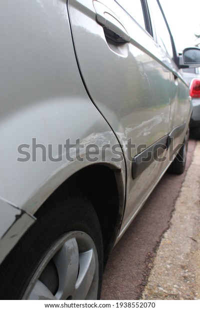 car accident, hit-and-run.\
a dent after car accident. photo of car accident damaged for\
insurance