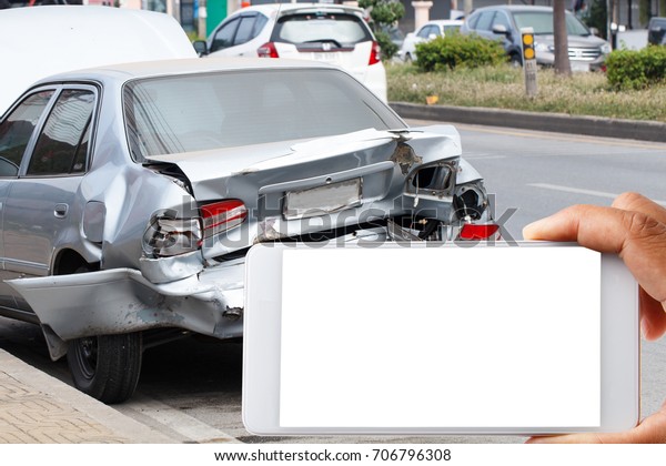 Car accident and insurance man hand holding blank\
smartphone for writing