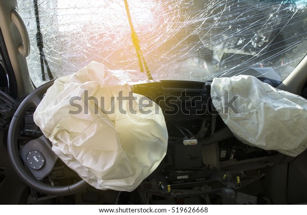 Car of accident Make airbag explosion damaged at\
claim the insurance company. Working car repair  inspection at\
damaged of accident. Claim the insurance company.  image blur focus\
 style.