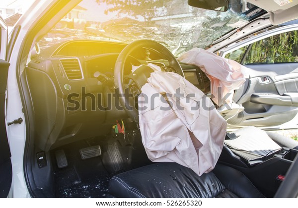 Car
of accident Make airbag explosion damaged at claim the insurance
company. Working car repair inspection at damaged of accident.
Claim the insurance company. image blur focus
style.